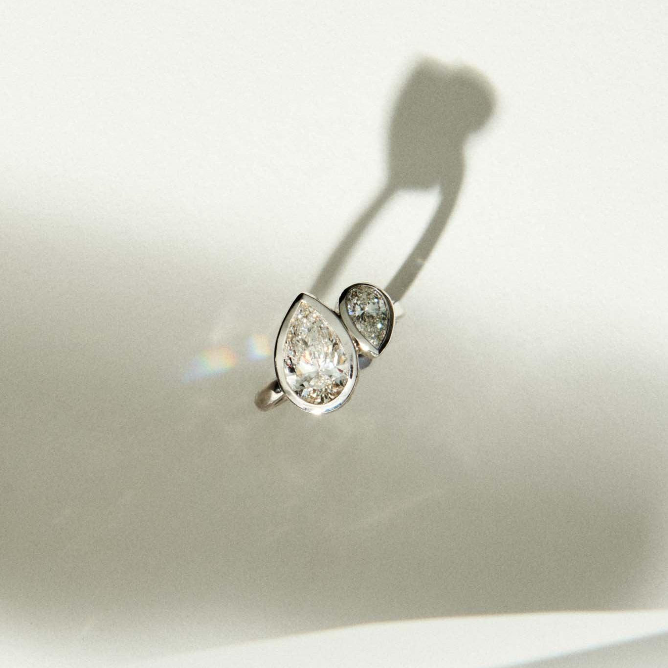 Bespoke Beauty: Pear-Cut Diamond Toi Et Moi Engagement Ring at EF Studios
