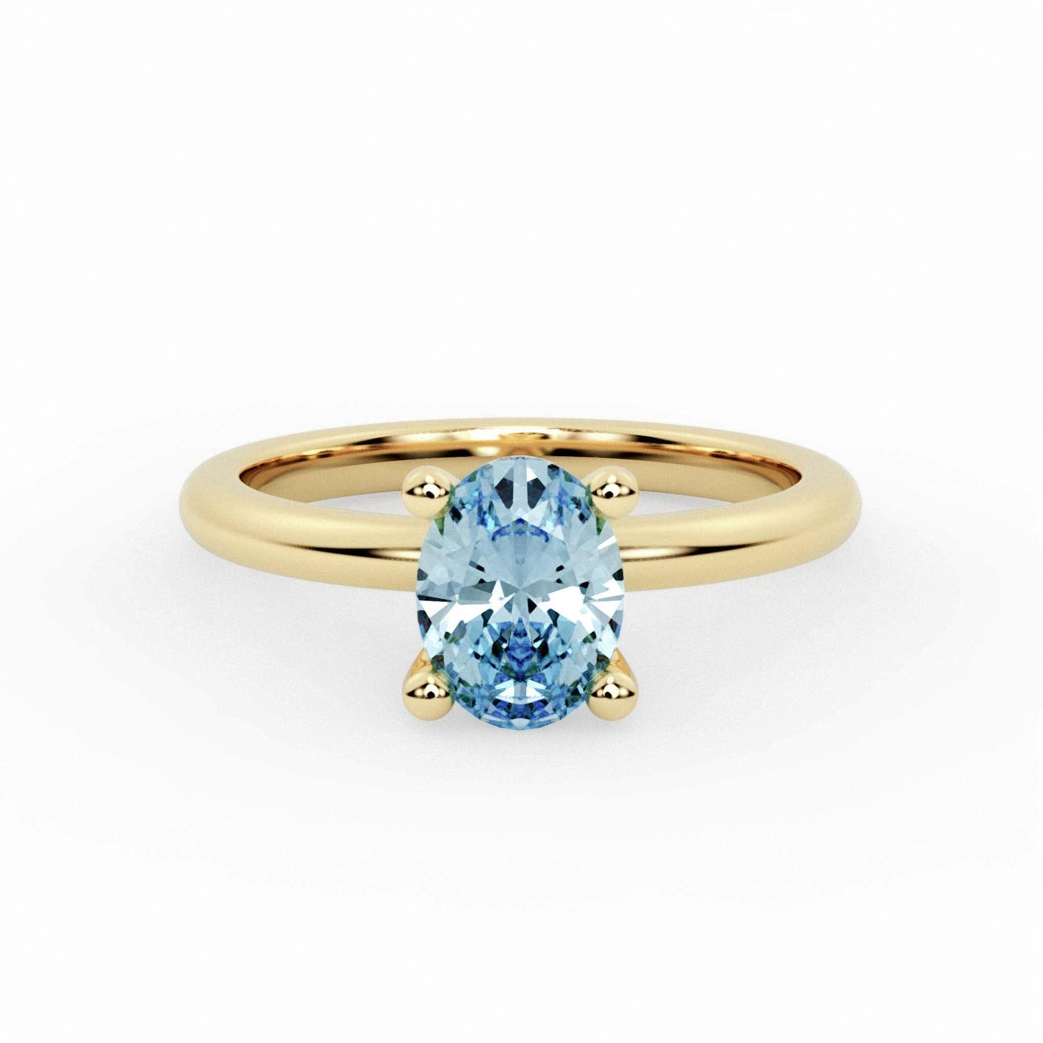 The Sophie Ring – Gold & Topaz Solitaire