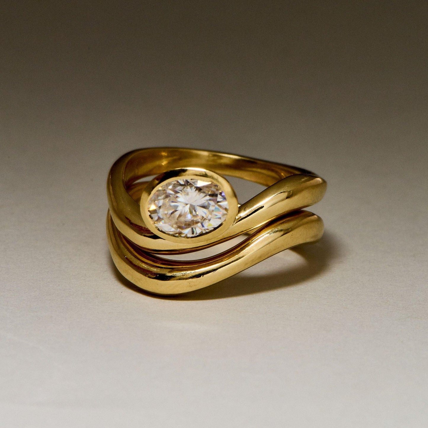 EFStudios Oval Bezel Floating Engagement Ring