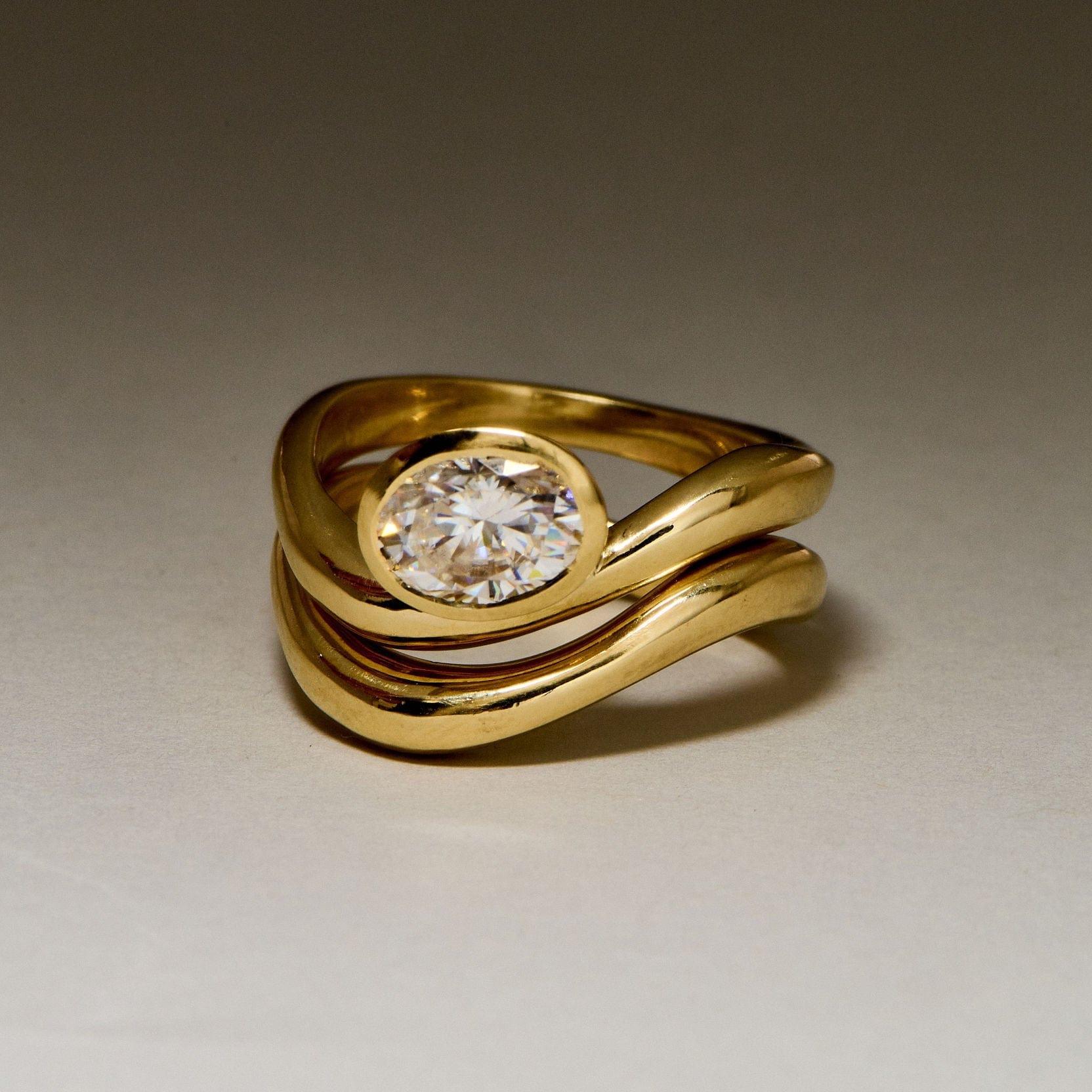 EFStudios Oval Bezel Floating Engagement Ring
